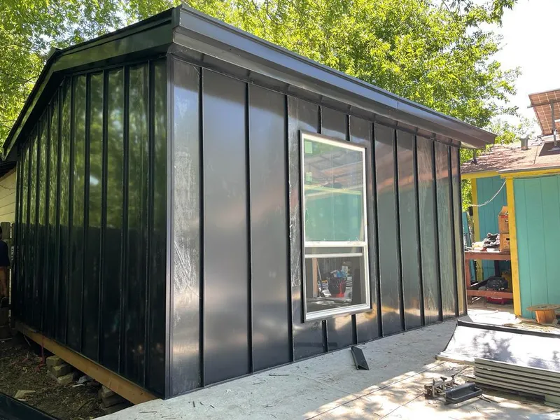 Black standing seam metal wall panels for Metal Roof Installation in New Canaan