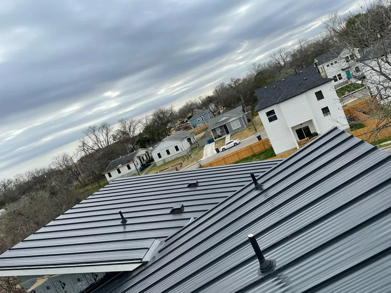 Standing seam metal roof panels with vents for Skylight Repair in New Canaan